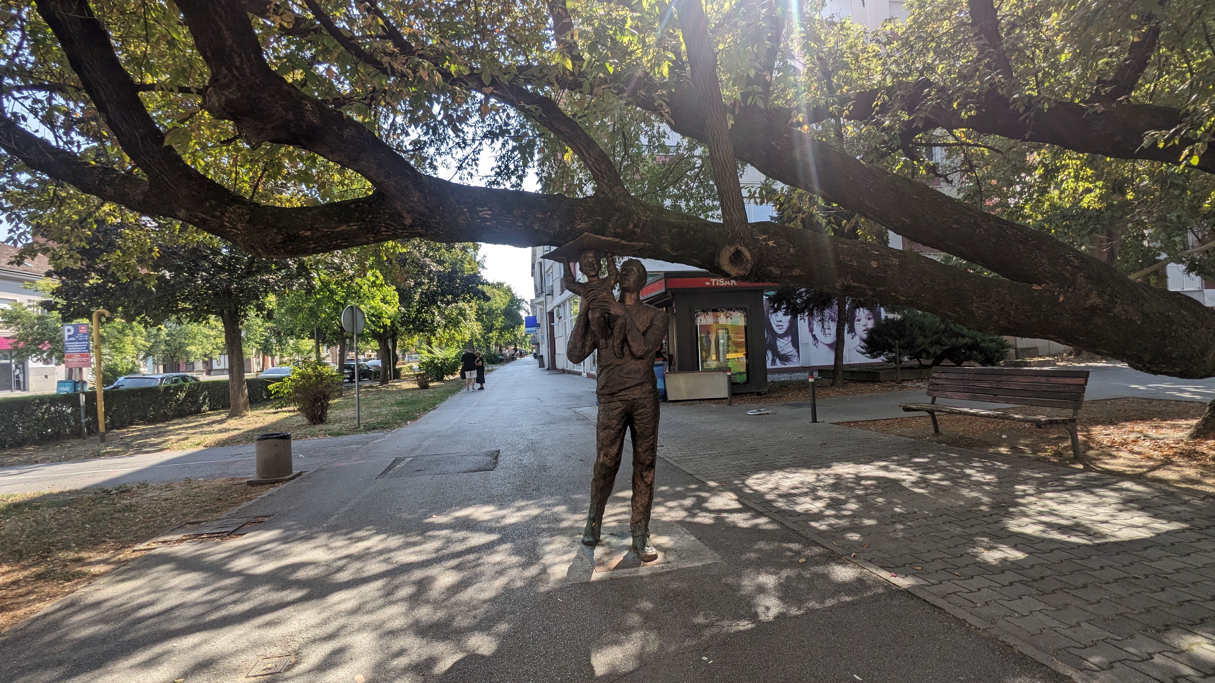 Statues supporting trees